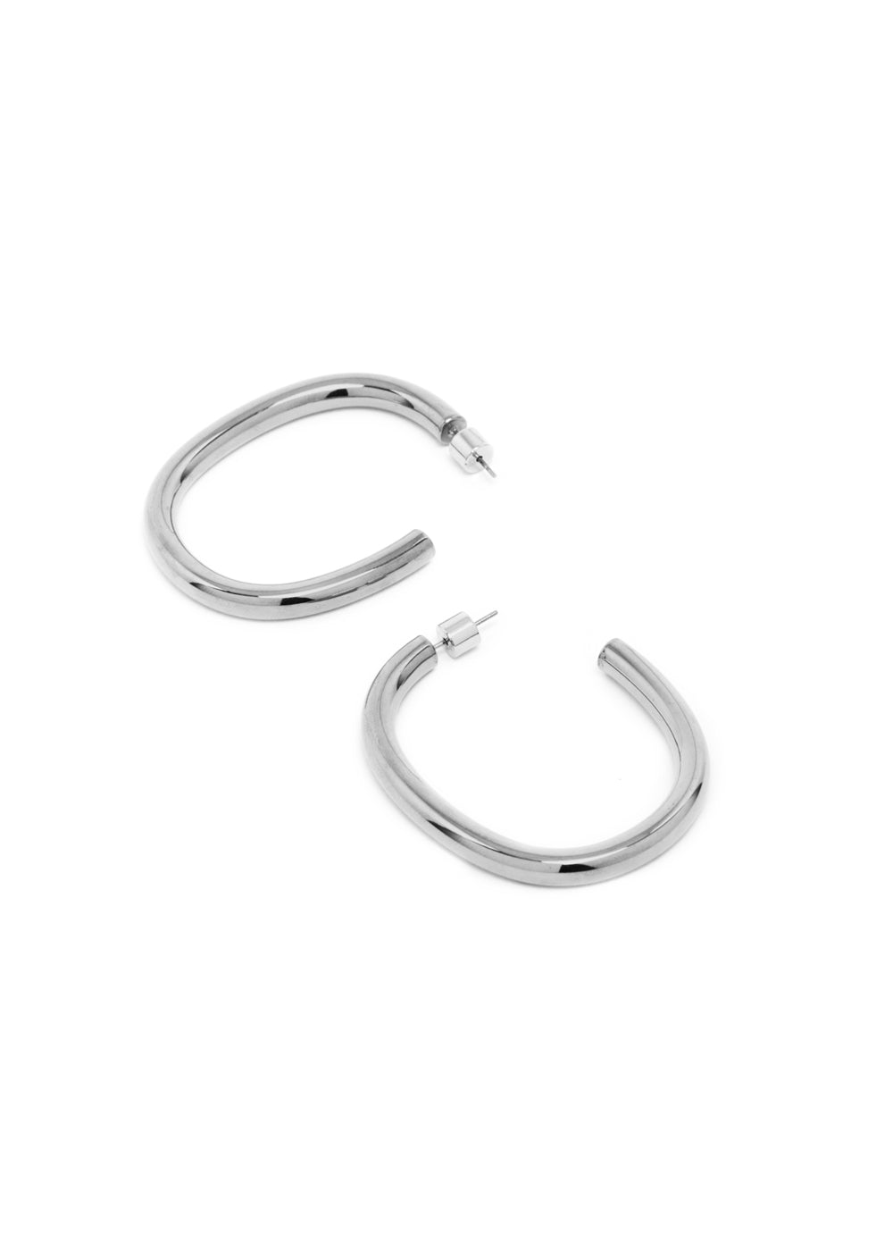 Nalí EARRINGS NINA HALF-HOOP SILVER COLOR Moda