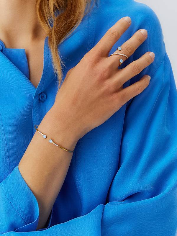 Nanis Anello ad incrocio "DANCING AZURE" in oro, diamanti e acquamarina – Nanis Italian Jewels Promozione