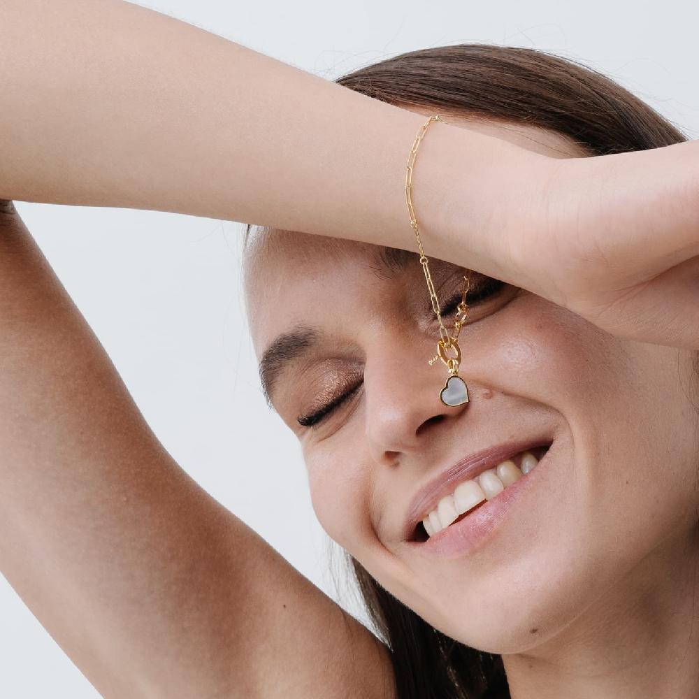 Unoaerre Bracciale in oro con pendente in madreperla | UNOAERRE Gioielli Pezzi Unici